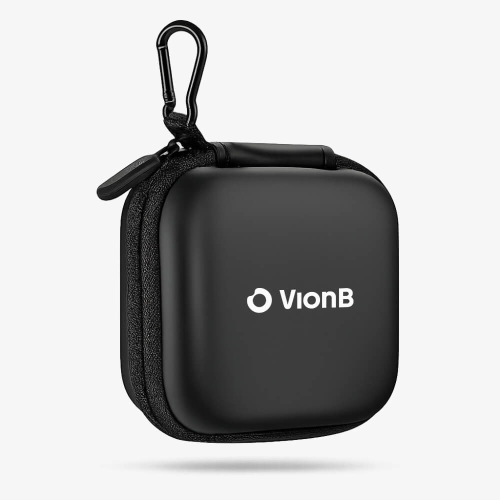 Product photograph of a black VionB square protective case featuring a prominent white VionB logo a sturdy black carabiner clip and a side zipper presented on a minimalist white background