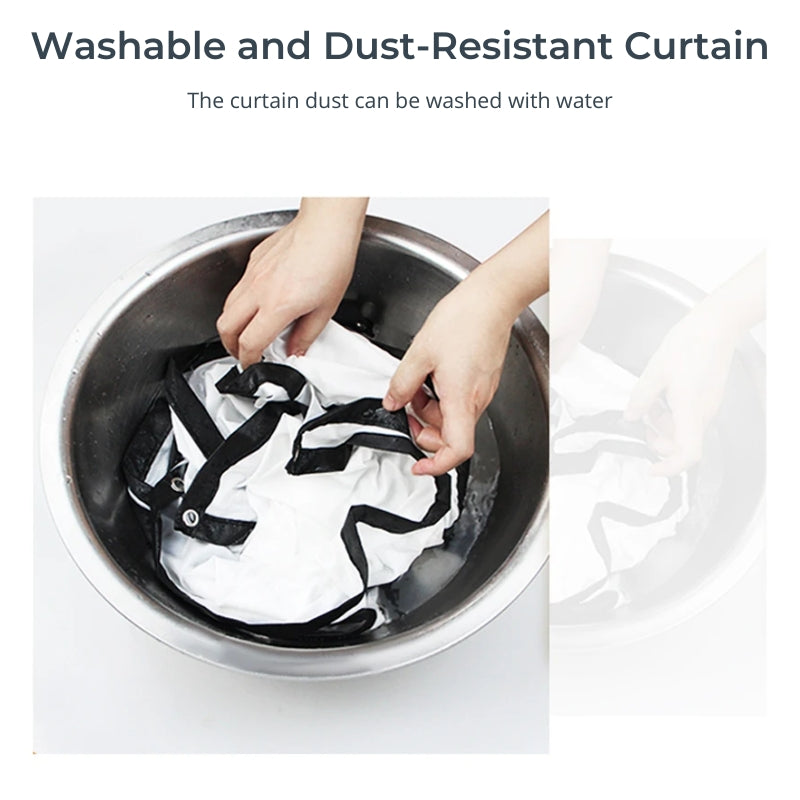 Photograph of hands washing a white dust-resistant curtain with black trim and a metal grommet in a silver metal bowl with water highlighting its easy washability
