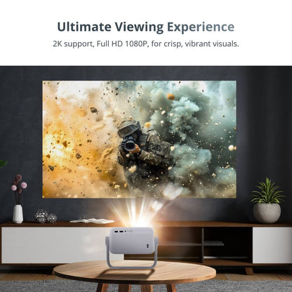 A light grey mini projector with a unique handle stand on a wooden coffee table in a modern living room projects an ultimate viewing experience of a soldier holding a camera amidst a fiery orange explosion and billowing grey smoke