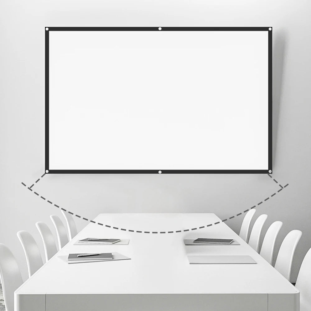 Image of a minimalist modern meeting room featuring a large white rectangular projection screen with a black border and corner grommets mounted above a long white conference table set with notebooks and flanked by white chairs, with a gray dashed line showing projection throw