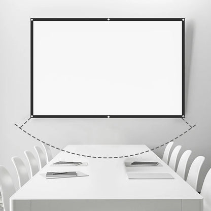 Image of a minimalist modern meeting room featuring a large white rectangular projection screen with a black border and corner grommets mounted above a long white conference table set with notebooks and flanked by white chairs, with a gray dashed line showing projection throw