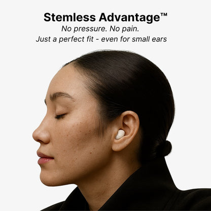 Digital photograph of a serene woman in profile with her eyes closed wearing a discrete white stemless earbud designed for a perfect, comfortable fit even for small ears
