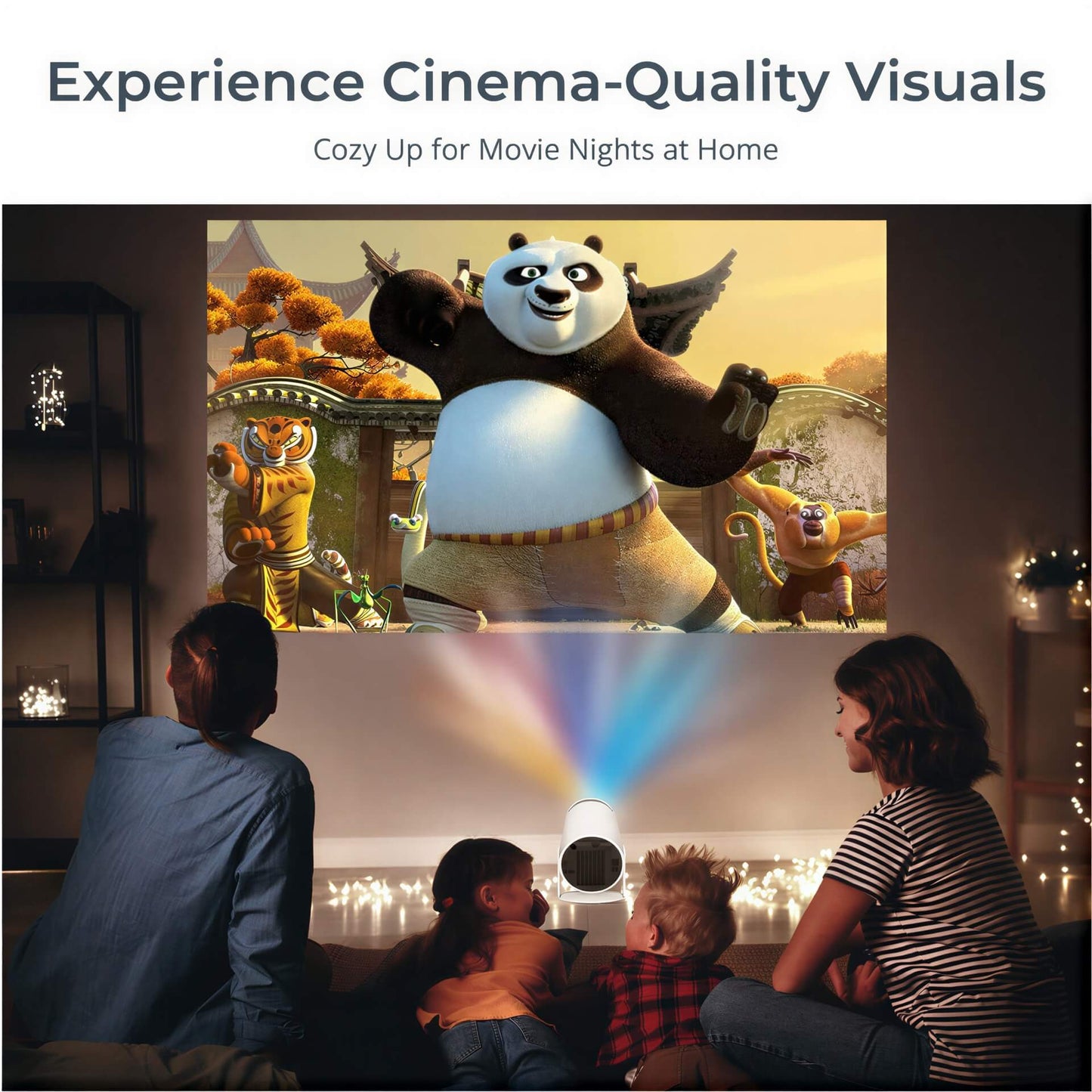 Digital projection of DreamWorks Animation's Kung Fu Panda featuring Po, Tigress, and Monkey against the backdrop of the Jade Palace architecture, shown on a large screen watched by a mother and three children in a cozy living room, illuminated by a white projector casting rainbow light beams and twinkling fairy lights