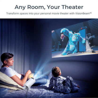 A photograph of a man holding popcorn and a child in patterned pajamas watching Disney Pixar's Monsters, Inc. featuring Sully and Boo, projected onto a wall in a darkened bedroom from a white projector emitting blue light