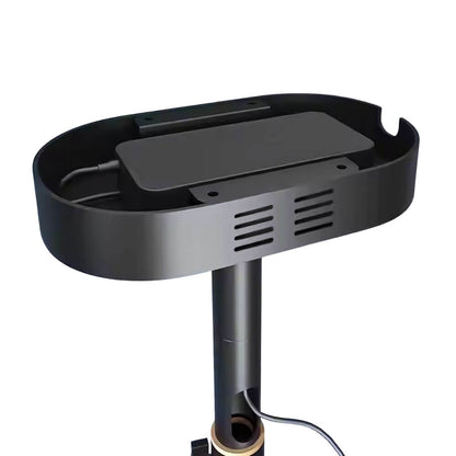 A sleek black wireless charging station featuring an oval top tray, vented side panels, and a cylindrical stand with a subtle gold accent